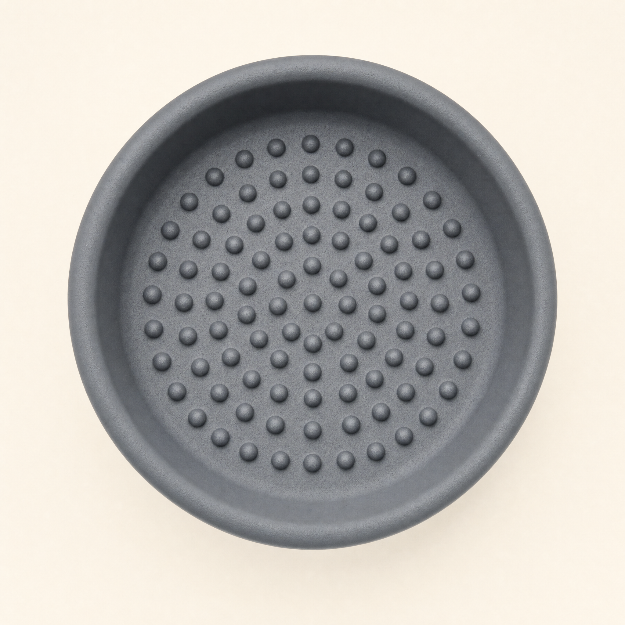 Top-down view of the bowl interior showing the molded slow-feeder dot pattern